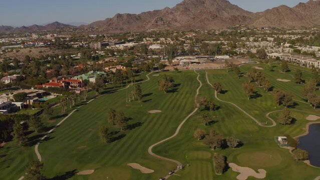 An aerial view of a golf corse in the American south west.