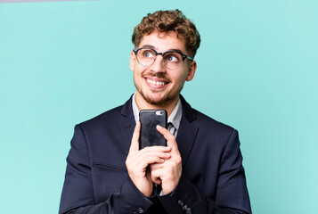young adult caucasian businessman with a smartphone