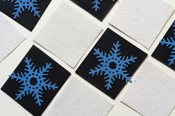 paper tiles and paper snowflakes