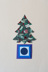 paper background with holiday tree shape and paper tiles with circle