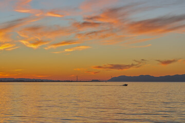 Silhouette of San Francisco Bay Area Landscape During Cloudy Sunset