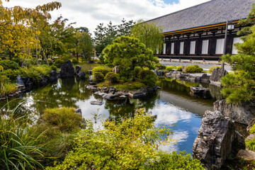 Fototapeta premium Scenic pond park exterior of Rengeoin Sanjusangendo temple shrine