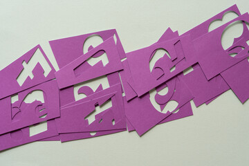 purple paper cutouts featuring numbers