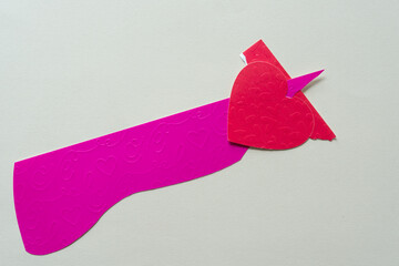 abstract spear and heart on blank paper