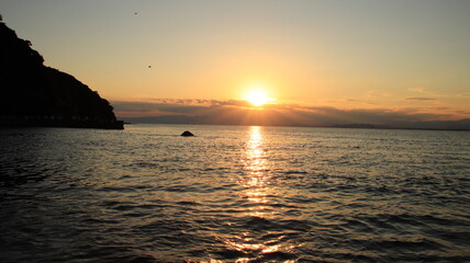 江ノ島の西浦漁港から見る夕陽の風景