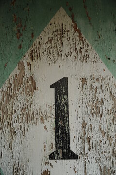 Number One Painted On Ticket Booth Of Old Amusement Park 