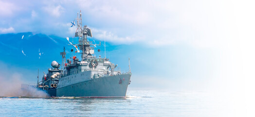 Russian warship going along the coast. Selective focus