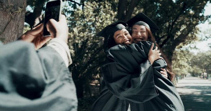 Students, graduation or celebration hug in phone picture on college, school or university campus. Happy smile, education graduates and friends or learning women in embrace in social media photography