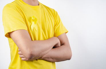 man showing yellow ribbon, september, suicide prevention day, childhood, sarcoma, bone and bladder...