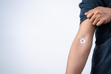 man showing plaster after donation blood, blood transfusion, world blood donor day, world...