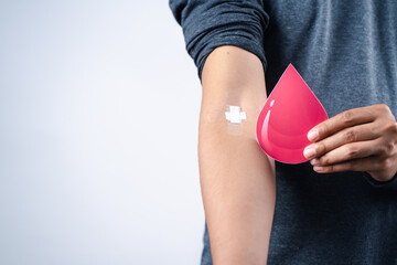 man hands holding donation blood paper cut, blood transfusion, world blood donor day, world...