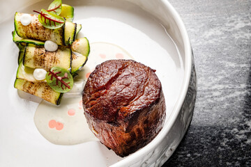 steak with grilled vegetables and sauce