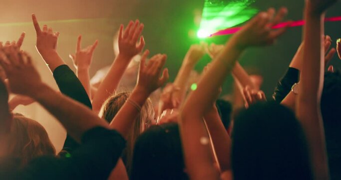 Crowd, dance and nenon lights in nightclub for dj concert, music performance and disco party. Audience, rock event and edm music for techno rave, musician celebration or dancing festival in club