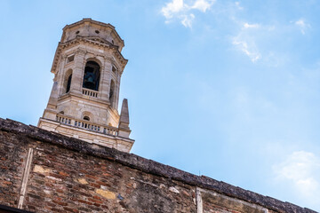 Fototapeta na wymiar Ancient wall with white stone tower of Verona