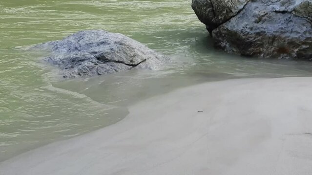 Morning view at GOA beach located in Rishikesh Uttarakhand near Laxman Jhula, Clean view of Ganga river at Rishikesh during early morning time, World famous GANGA river full view
