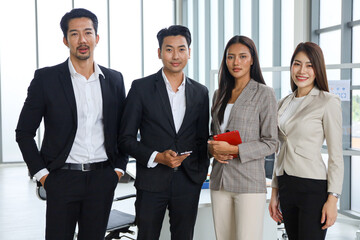 Business people relax meeting in office by using laptop computer and discussion or brainstorming
