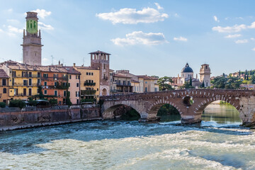Fototapeta premium Bridge over the Verona river with ancient town in the background