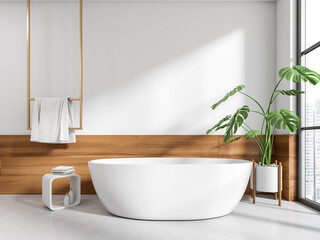 Naklejka na ściany i meble Front view on bright bathroom interior with bathtub, panoramic window