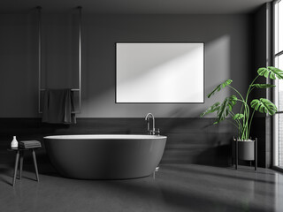 Fototapeta na wymiar Dark bathroom interior with bathtub, empty white poster, panoramic window