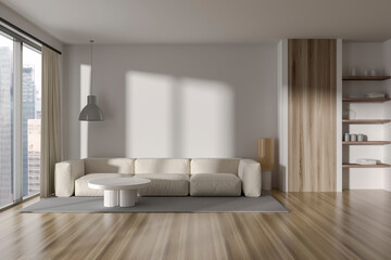 Front view on bright living room interior with sofa, table