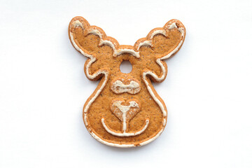 Christmas gingerbread cookies in the shape of Santa's reindeer on a white background