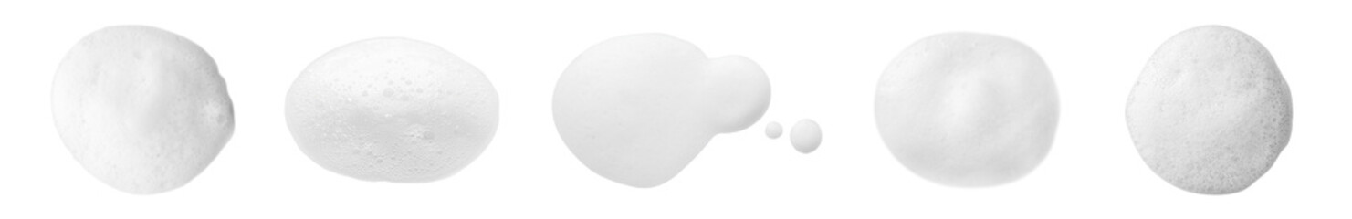 Set with drops of fluffy soap foam on white background, top view. Banner design - obrazy, fototapety, plakaty