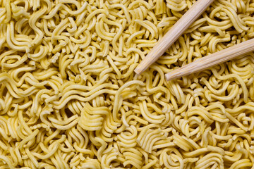 Texture of instant noodles with chopstick