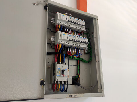 SELANGOR, MALAYSIA -AUGUST 19, 2022: Electrical distribution board and it's component in the installation process. Electrical wireman will install this equipment according to the electrical engineer d