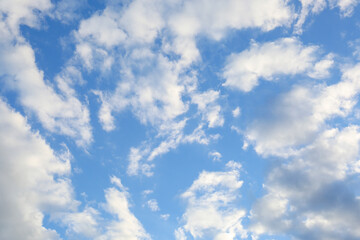 Picturesque view of beautiful fluffy clouds in light blue sky