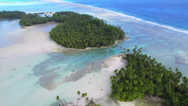Aerial shot of tropical islands, lagoon and tidal channels.