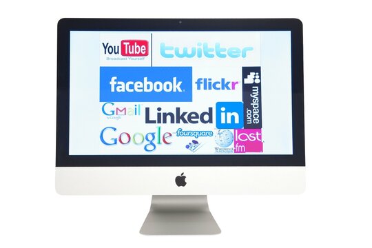 GDYNIA, POLAND - 28 SEPTEMBER 2011: Computer Apple iMac screen with social network logos isolated on white background studio shot