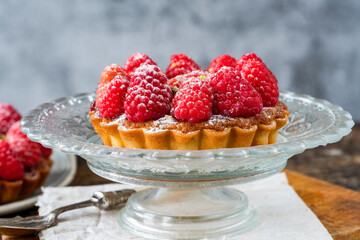 Raspberry and pistachio tart