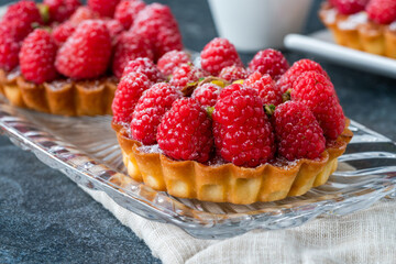 Raspberry and pistachio tarts