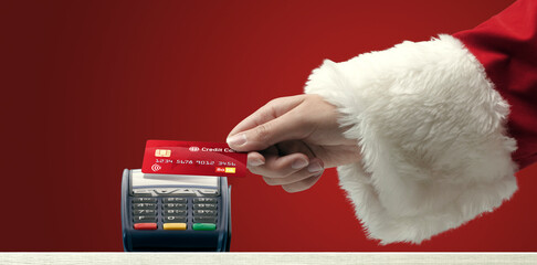 Santa Claus paying with a credit card