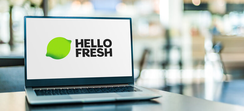 Laptop computer displaying logo of HelloFresh