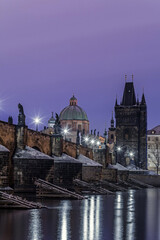 Charles bridge over Vltava river in the morning in winter. Winter. Prague.	