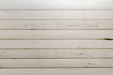 Obraz na płótnie Canvas White old wooden wall with old paint