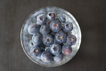 Blueberries in a glass bowl.