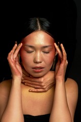 Fototapeta premium Headache and cold. Feeling unwell. Asian girl.