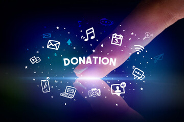 Obraz premium Finger touching tablet with social media icons concept