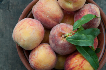 Still life of peaches on the table