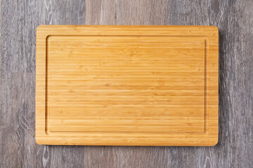 Empty cutting board on the kitchen table, home cooking