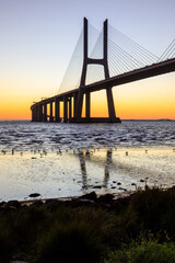 Vasco da Gama bridge at sunrise in a cold November morning: this bridge is simply beautiful, curvy and sexy!