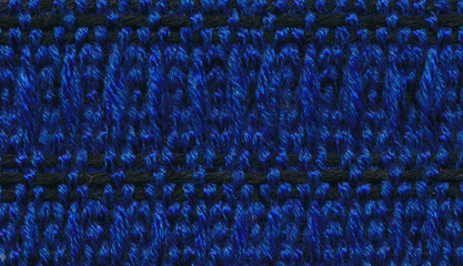 Closeup of black and blue handwoven fabric