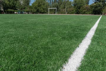 Marking on a modern stadium with artificial turf. School stadium.