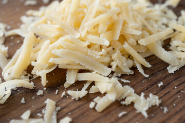 Heap of grated parmesan, healthy food, dairy product