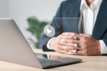 Businessman use laptop for streaming online, watching video on internet, live concert, show or tutorial.