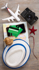 The concept of paying for travel using internet banking, buying plane tickets and booking a hotel online