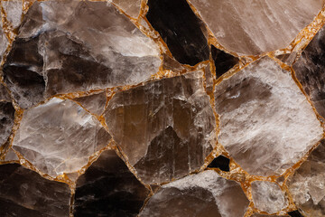 Brown smoky quartz stone slab. Gemstone background. Matt semi precious mineral pattern....