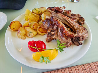 lamp rack with potatoes and tomatoes